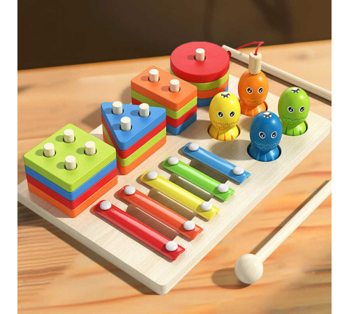 Логічна дерев’яна дошка C 74245 (40) магнітна риболовля, гра з кілочками, сортер, ксилофон, в коробці – в наличии! Купите сейчас у KAZKOVA