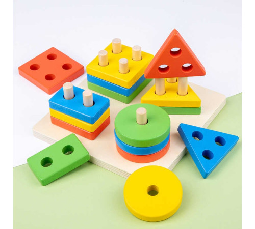 Дерев'яний геометричний сортер 74370 (48) розмір - 13.5х15х5 см, геометричні фігури, кольори, в коробці – в наличии! Купите сейчас у KAZKOVA