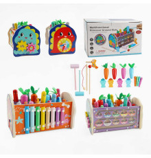 Ігровий центр C 65677 (18) дерев’яний, магнітна риболовля, магнітне сортування кульок, ксилофон, стукалка, гра “Грядка з морквинками”, рухомі шестерні, в коробці