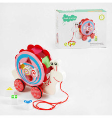 Каталка C 64011 (24) “Равлик”, дерев’яна, сортер, 5 фігурок, обертається мушля, в коробці