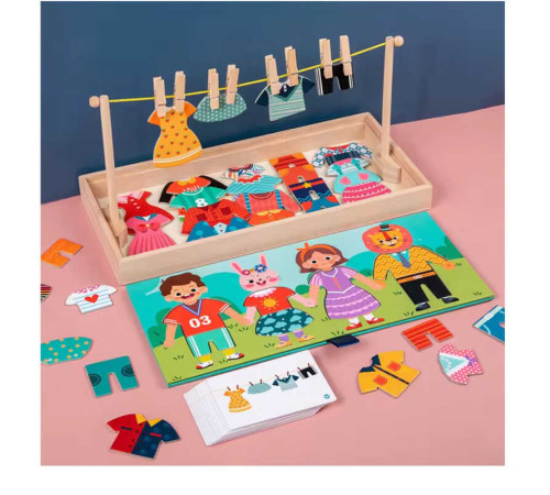 Логічна гра C 73232 (36) картки із завданнями, дерев’яна, прищіпки, елементи у вигляді одягу, в коробці – в наличии! Купите сейчас у KAZKOVA