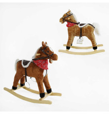 Качалка-гойдалка музична B 38760 (8) 2 кольори, “Кінь”, 73х29х75 см, пісня англ. мовою, рухається хвіст, відкривається рот, в пакеті
