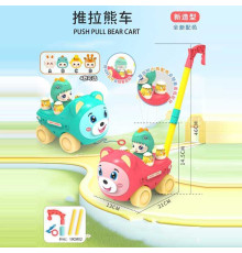 Каталка 8517 B (48/2) 2 види, 13 см х 21 см х 46 см, дзвіночок, обертається фігурка, в пакеті