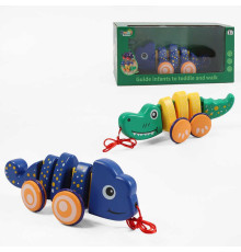 Каталка 336 / 337 (48) "Тваринка", 2 види, рухомі елементи, гумові накладки на колеса, в коробці