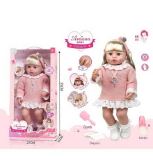 Лялька A 911 C (12/2) гумова, висота - 52 см, заплющує очі, функціональна, прошите волосся, рухомі кінцівки, пляшечка, підгузок, ходить на горщик, щітка для волосся, взуття, в коробці