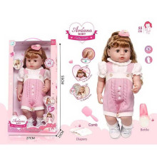 Лялька A 909 D (12/2) гумова, висота - 52 см, заплющує очі, функціональна, прошите волосся, рухомі кінцівки, пляшечка, памперс, ходить на горщик, щітка для волосся, в коробці