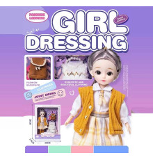 Лялька Q-A 23 (72/2) висота - 30 см, тіло — пластик, голова — гума, шарнірні з’єднання суглобів, знімне взуття, змінний одяг, аксесуари, в коробці