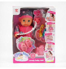 Пупс 8652 (18) висота: 28 см, музичний чип, ходить на горщик, знімний одяг та взуття, пляшечка, соска з тримачем, тарілка, виделка, ложка, ніж, горщик, в коробці