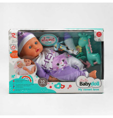 Пупс 6293 (24) м’якотілий, п’є з пляшечки, пляшечка, брязкальце, музичний чіп, висота 31 см, в коробці