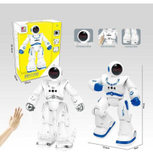 Робот на радіокеруванні CX 68 (24) 2 кольори, розмір - 15.5х9х27, вбудований акумулятор, пульт, USB - кабель, сенсорний датчик руху, англійська мова, мелодії, пісні, звуки, історії, танцює, ковзає, крокує, підсвічування, програмування, в коробці