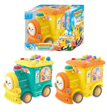 Музичний паровозик 95606 (72/2) "WToys", 2 кольори, ОЗВУЧУВАННЯ УКРАЇНСЬКОЮ МОВОЮ, казки, пісні, скоромовки, загадки, світло, пальчикові ігри, гра-стукалка, в коробці