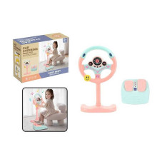 Кермо 2192 E-72 Штрихкод=92477 (18) колір РОЖЕВИЙ, висота підставки 34 см, звукові ефекти, озвучування англійською, веселі мелодії, підсвічування, педалі гальма та газу, присоски, в коробці