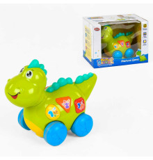 Музичний динозаврик Діно 7725 (18/2) їздить, підсвічування, англ. озвуч, пакування рос. мовою, в коробці