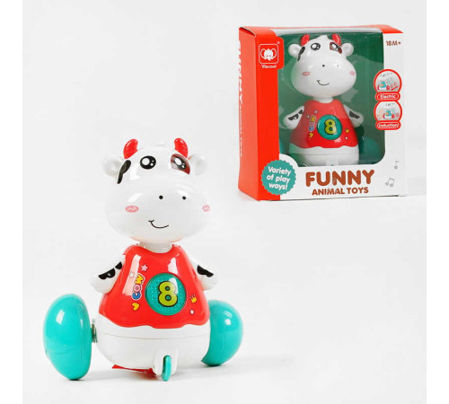 Корівка 818 (72/2) на батарейках, весела мелодія, підсвічування, рухається, реагує на плескання долонями, в коробці