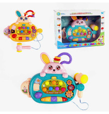 Гра “Зайчик-розвивайчик” 77697 (72/2) "WToys", ОЗВУЧУВАННЯ УКРАЇНСЬКОЮ МОВОЮ, підсвічування, піаніно, пальчикові ігри, інтерактивна гра, пісеньки, казки, в коробці