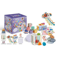 Набір для розвитку 1296 (18) 34 елементи, кубики, брязкальця, прорізувачі, фігурка, пірамідка, серветки, мішечок, куб із формами, в коробці