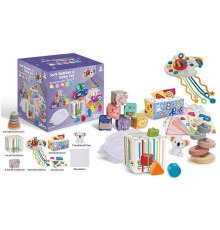 Набір для розвитку 1297 (18) 34 елементи, кубики, брязкальця, прорізувачі, фігурка, пірамідка, серветки, мішечок, куб із формами, в коробці