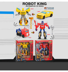 Трансформер 0754-15 (36) 2 види, кінцівки обертаються, зброя, пластикові колеса, в коробці